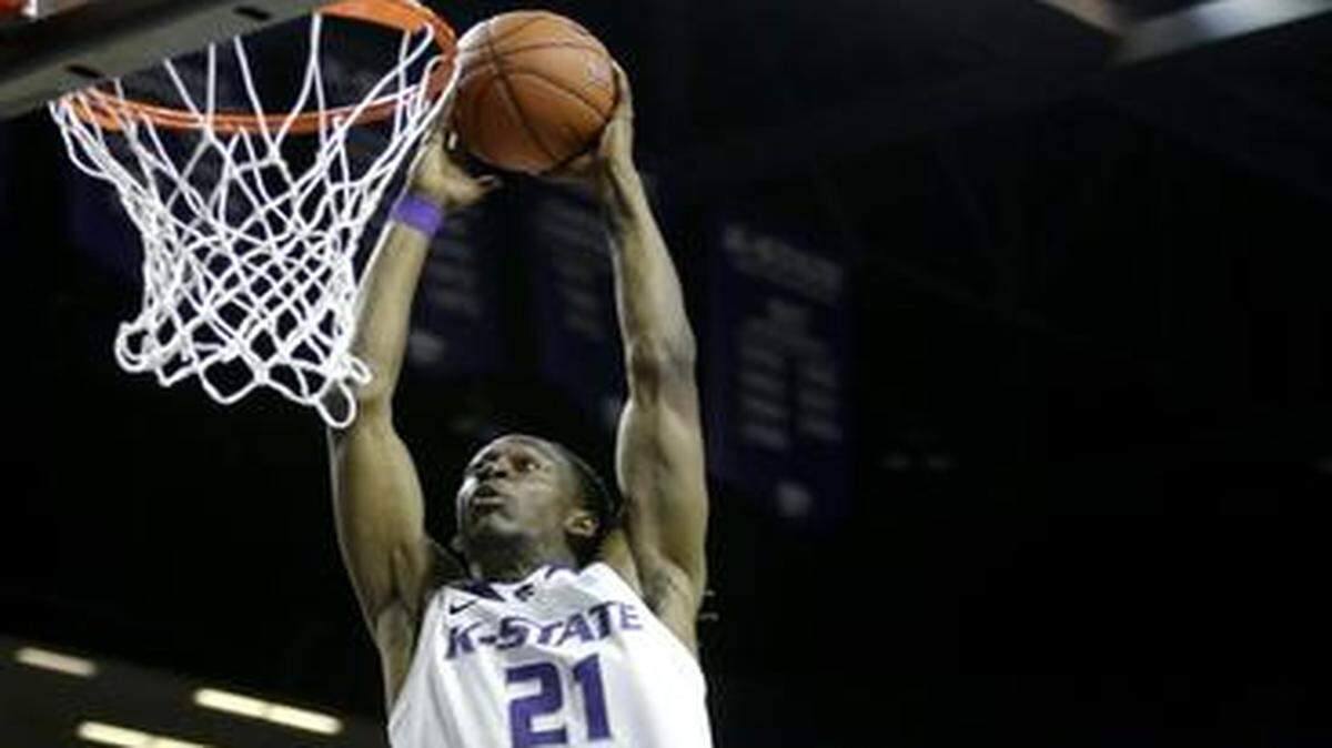 
Kansas State’s Brandon Bolden dunked during Friday night’s game. Bolden later had a huge blocked shot.
