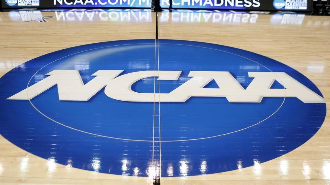 In this March 18, 2015, file photo, the NCAA logo is at center court at The Consol Energy Center in Pittsburgh.