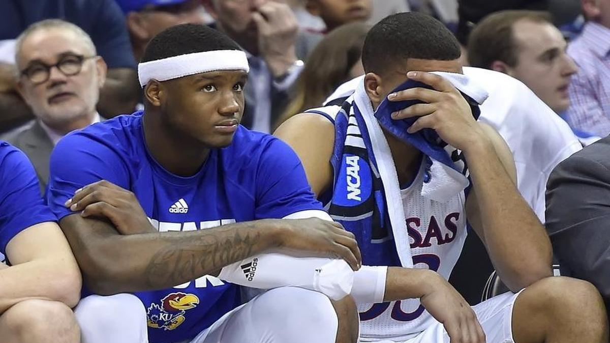 Kansas Jayhawks forward Landen Lucas covered his face in the closing moments of the 74-60 loss to the Oregon.