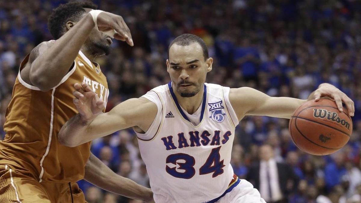 
Kansas forward Perry Ellis drove on Texas center Prince Ibeh during a game in February.

