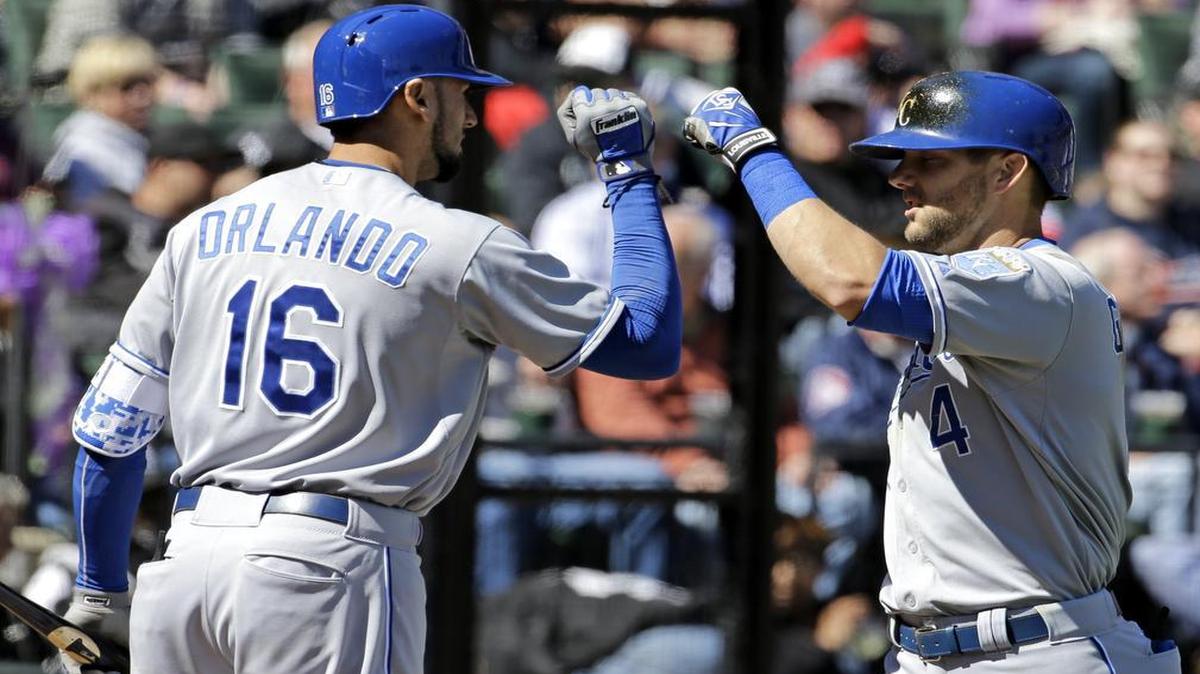 
Alex Gordon was greeted at home plate by teammate Paulo Orlando after Gordon hit a two-run home run on Sunday.
