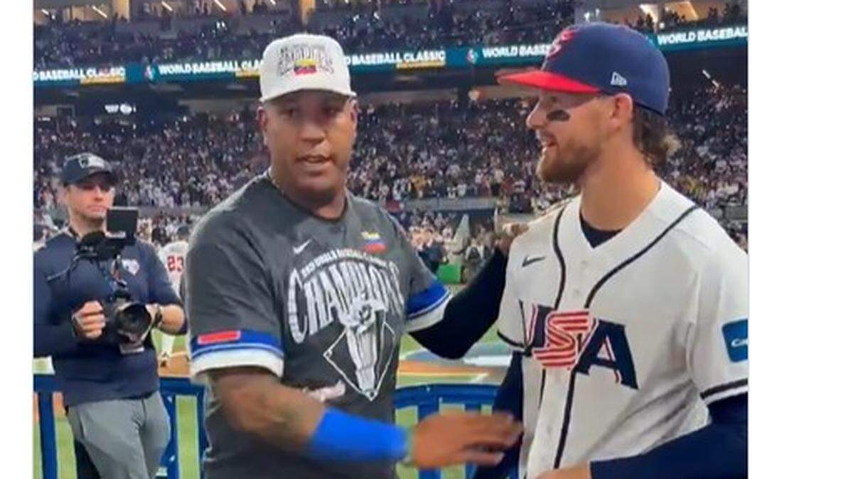 The Royals’ Salvador Perez and Bobby Witt Jr. met on the field after the World Baseball Classic championship game.