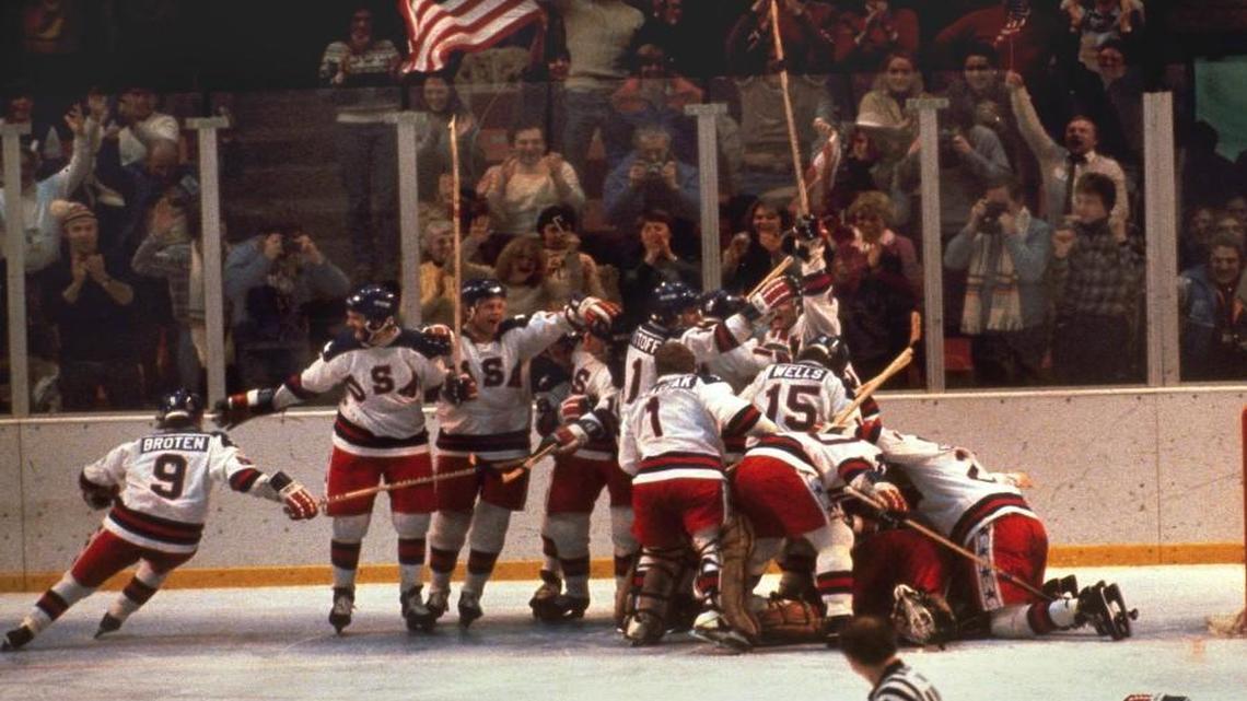 In this 1980 file photo, the U.S. hockey team pounces on goalie Jim Craig after a 4-3 victory against the Soviet Union in the 1980 Winter Olympics in Lake Placid, N.Y.