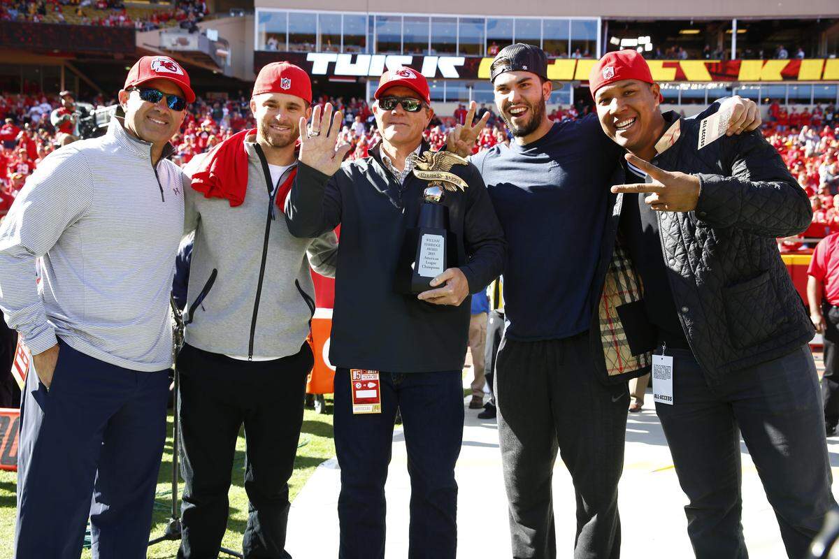 Kansas City Royals Pedro Grifol, Drew Butera, Ned Yost, Eric Hosmer, and Salvador Perez are recognized with the American League Championship Trophy before the game between the Pittsburgh Steelers and the Kansas City Chiefs at Arrowhead Stadium on Oct. 25, 2015 in Kansas City, Missouri.