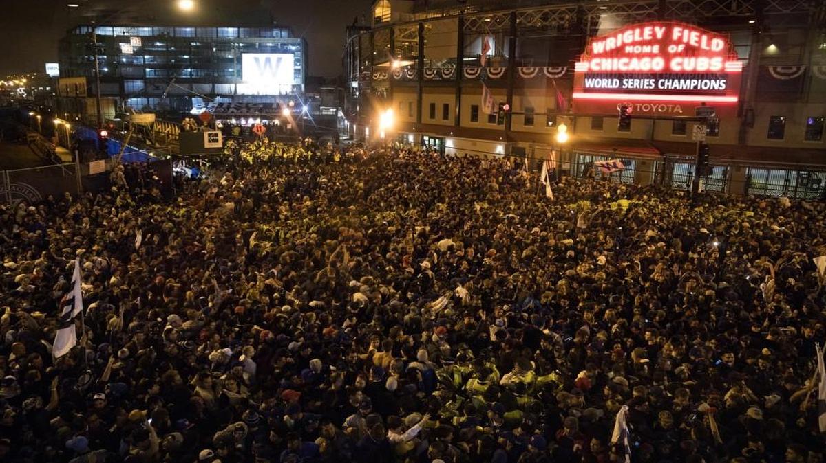 Fans celebrate the Chicago Cubs’ historic World Series win over the Cleveland Indians on Thursday in Wrigleyville in Chicago.