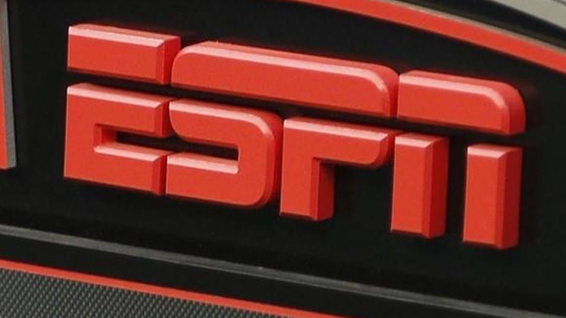 This Sept. 16, 2013, file photo shows the ESPN logo prior to an NFL football game between the Cincinnati Bengals and the Pittsburgh Steelers, in Cincinnati.