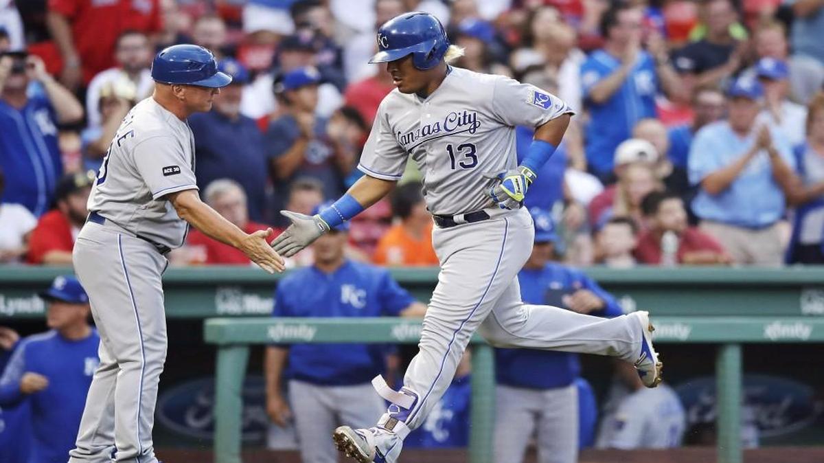 Kansas City Royals catcher Salvador Perez was congratulated by third base coach Mike Jirschele after his solo home run off Boston Red Sox starting pitcher Rick Porcello on Friday night.