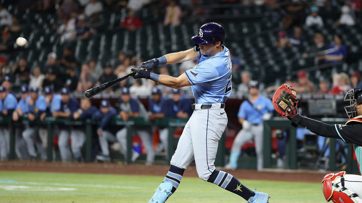 Kameron Misner of the Tampa Bay Rays hit an RBI double against the Arizona Diamondbacks during the 11th inning of a game at Chase Field on April 23, 2025, in Phoenix, Arizona. The Rays defeated the Diamondbacks 7-6 in 11 innings.