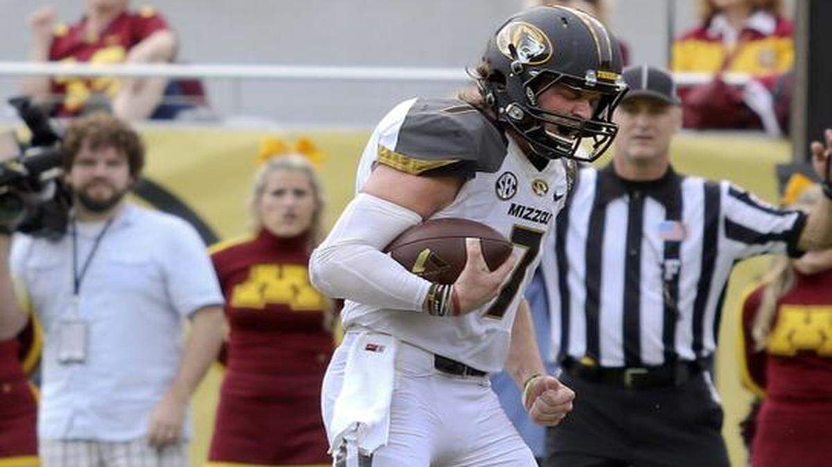 
Missouri quarterback Maty Mauk celebrated after running for a touchdown the Citrus Bowl.

