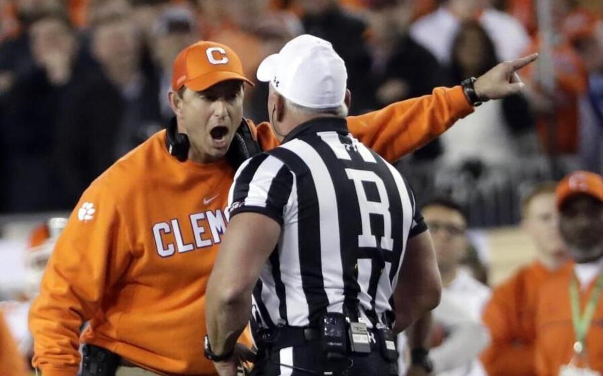 Clemson head coach Dabo Swinney argued a call with referee Mike Defee.