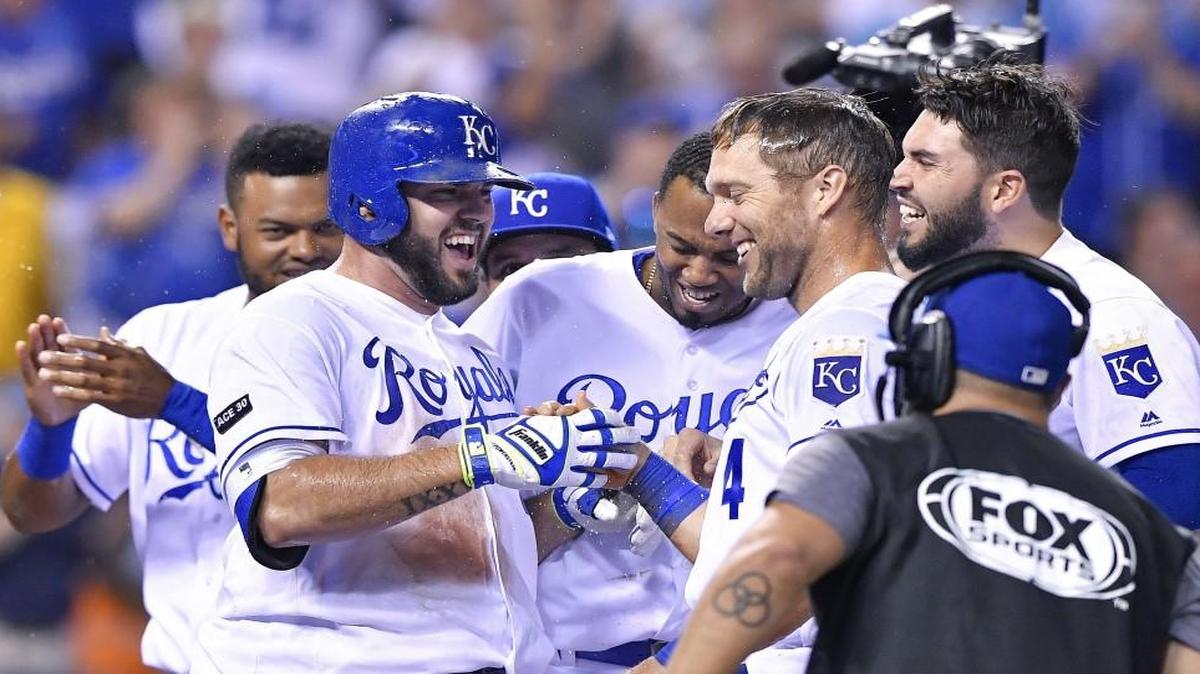 Kansas City Royals third baseman Mike Moustakas celebrated with Alex Gordon after Moustakas hit a two-run home run in the ninth inning of a June 2017 game.