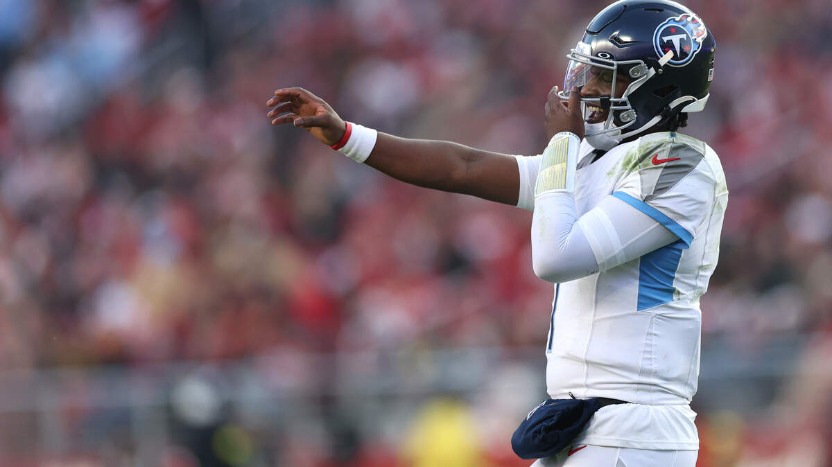 Cam Ward of the Tennessee Titans reacts after throwing a touchdown to teammate Jeffery Simmons during the fourth quarter against the San Francisco 49ers at Levi's Stadium on Dec. 14, 2025 in Santa Clara, California.
