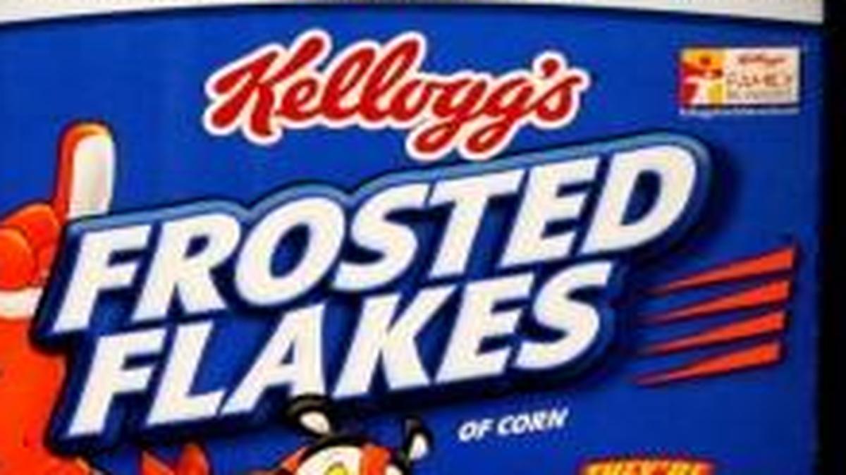 In this April 9, 2014 photo, Kellogg’s Frosted Flakes are stocked on shelves at a grocery store in Fargo, N.D.