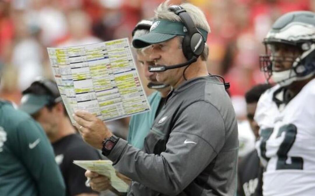 Philadelphia Eagles head coach Doug Pederson with his play sheet.
