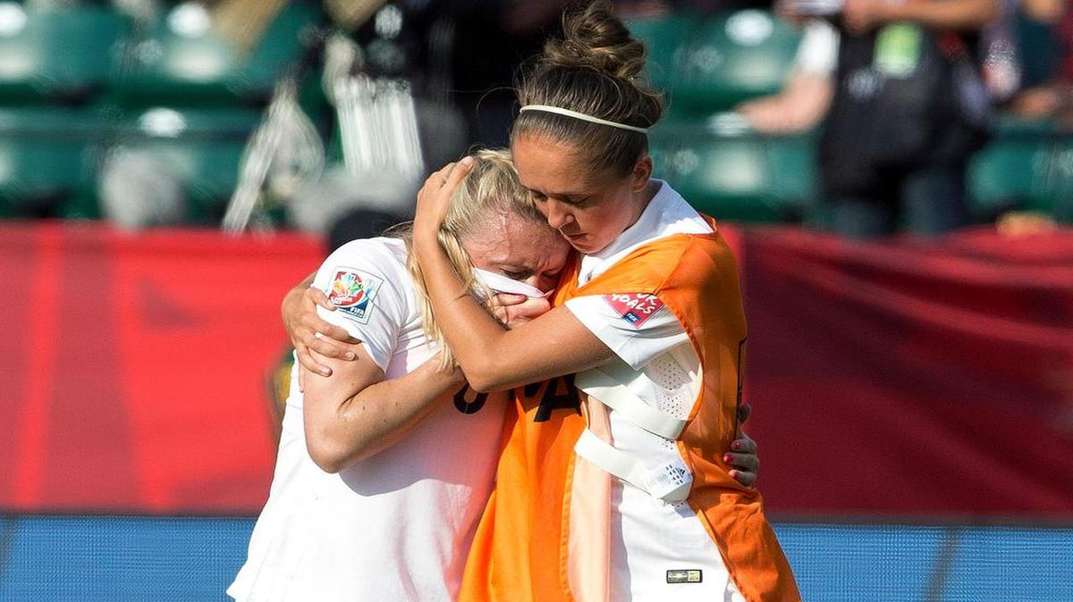 
England’s Josanne Potter (right) consoles Laura Bassett after a 2-1 loss to Japan in a semifinal in the FIFA Women’s World Cup tournament on Wednesday in Edmonton, Alberta, Canada. 
