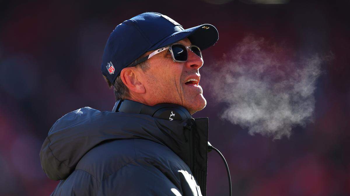 Chargers coach Jim Harbaugh looks on during the second quarter against the Kansas City Chiefs at Arrowhead Stadium on Dec. 14, 2025 in Kansas City, Missouri.