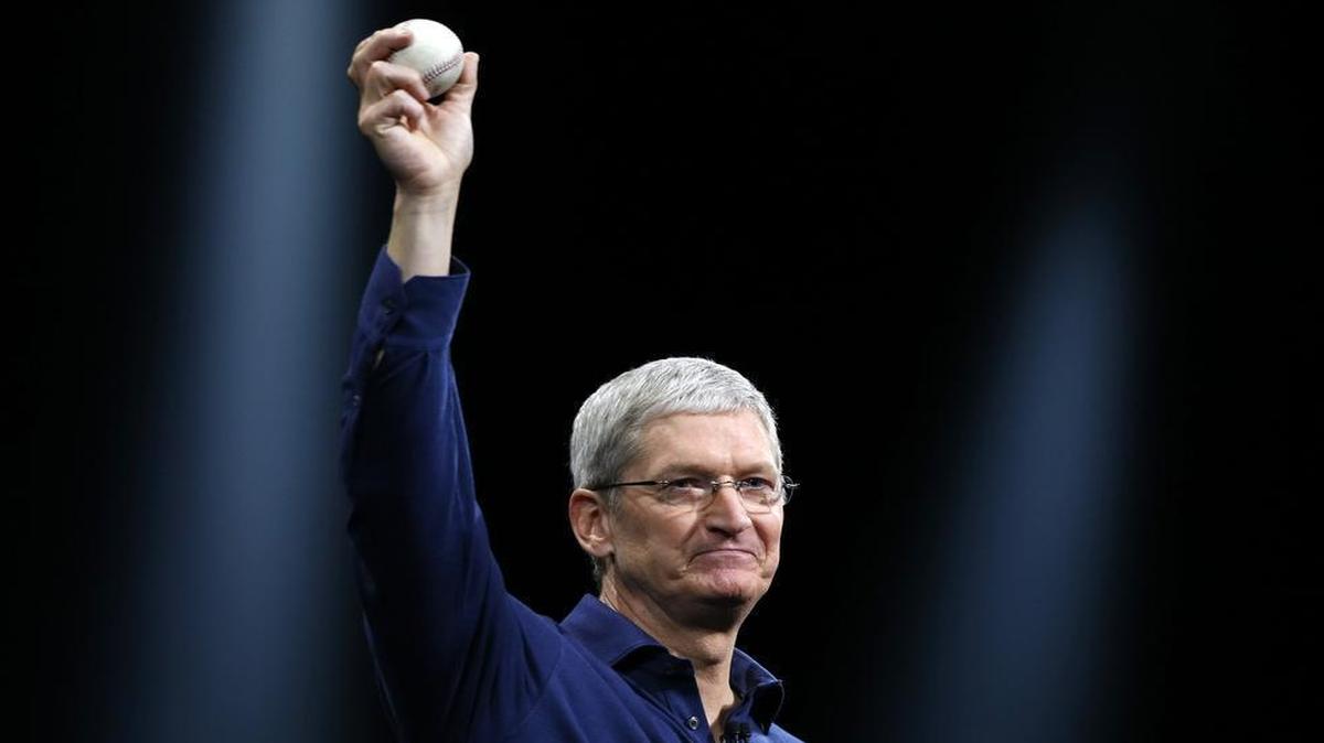 
Apple's Tim Cook holds up Brandon Moss' 100th career home run during the keynote speech at the Worldwide Developers Conference on Monday in San Francisco
