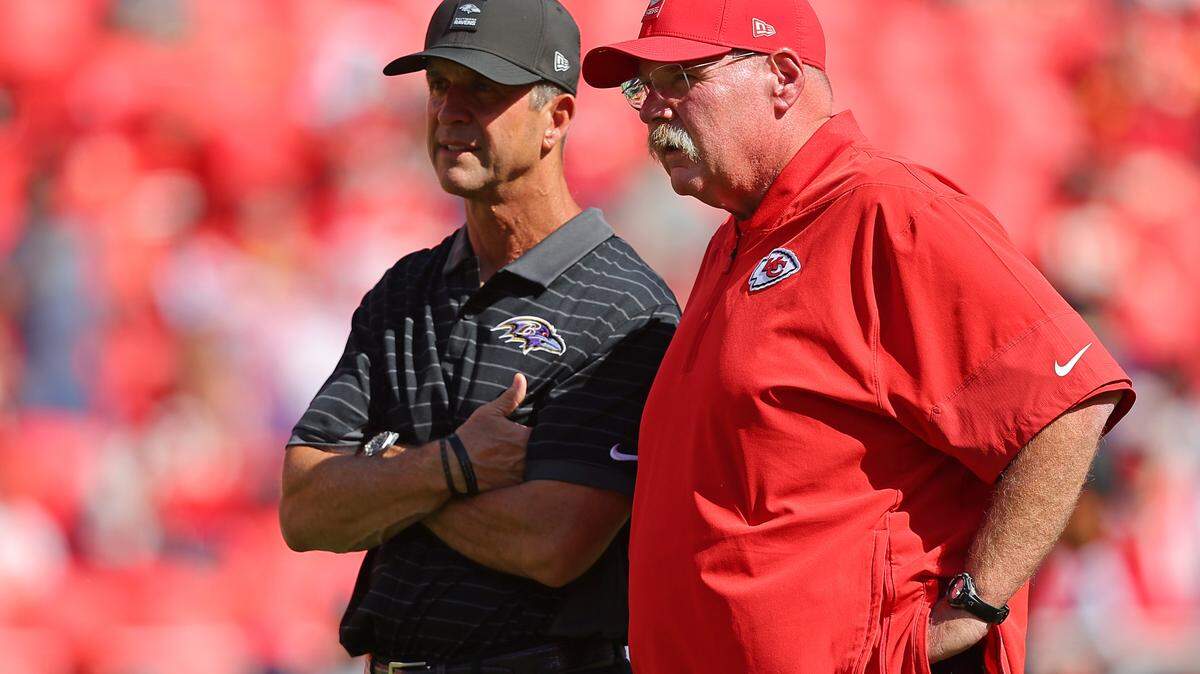Head coach Andy Reid of the Kansas City Chiefs and head coach John Harbaugh of the Baltimore Ravens look on prior to a game at Arrowhead Stadium on Sept. 28, 2025 in Kansas City, Missouri.