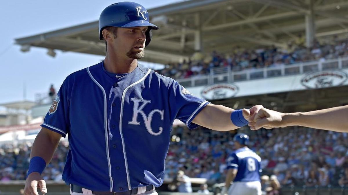 Bubba Starling was greeted after scoring on a single in a spring-training game.
