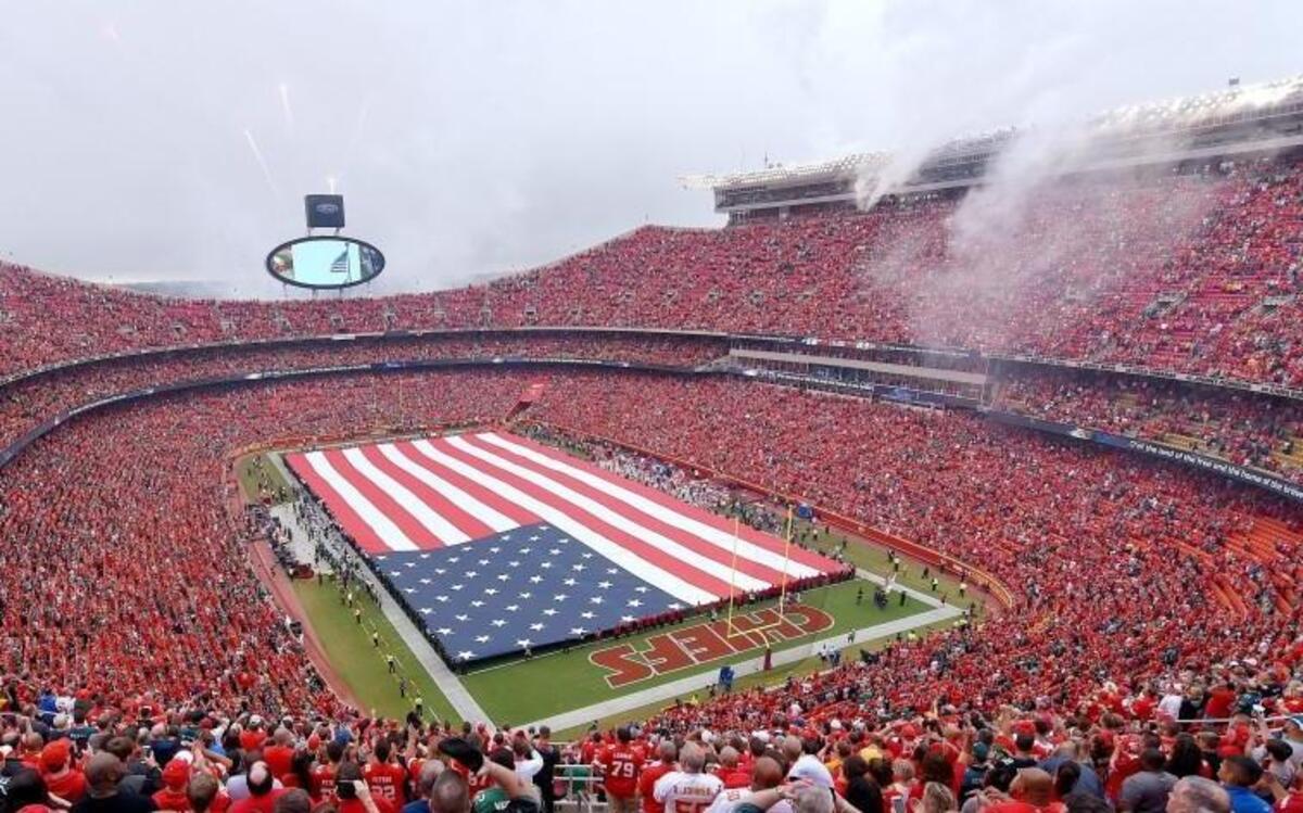 Fans cheer at the end of the national anthem at Arrowhead Stadium during a game earlier this month.