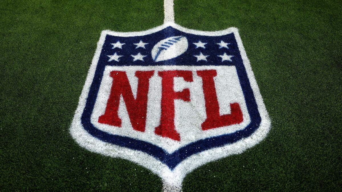 A detailed view of the NFL shield logo on the 25-yard line after the game between the Los Angeles Chargers and the Washington Commanders at SoFi Stadium on Oct. 05, 2025 in Inglewood, California.