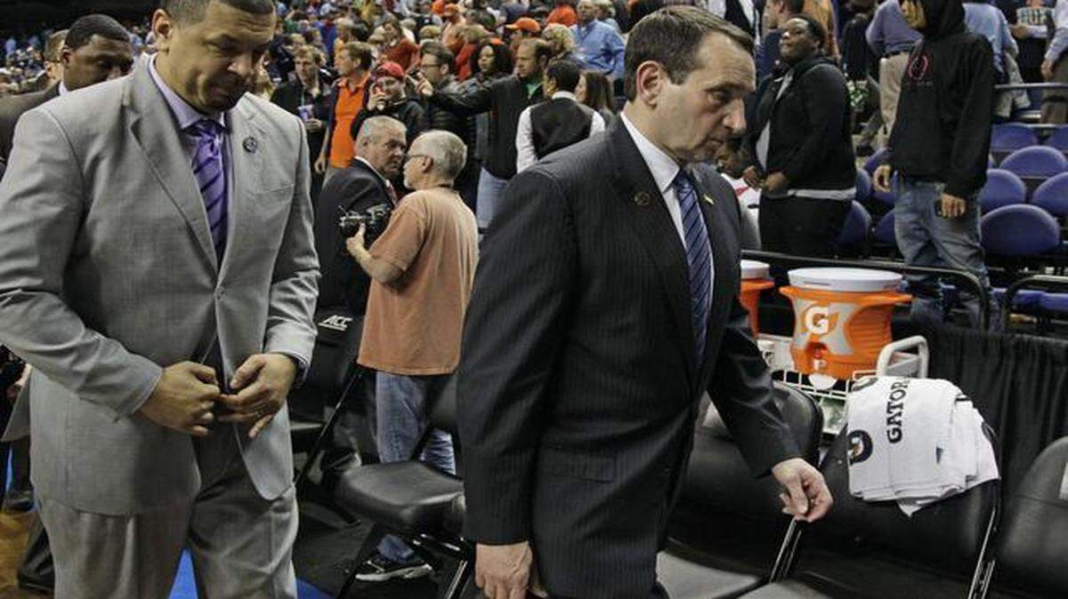 
Duke head coach Mike Krzyzewski (right) and assistant coach Jeff Capel (left) walked off the court after Friday’s loss against Notre Dame in the semifinals of the Atlantic Coast Conference tournament in Greensboro, N.C.
