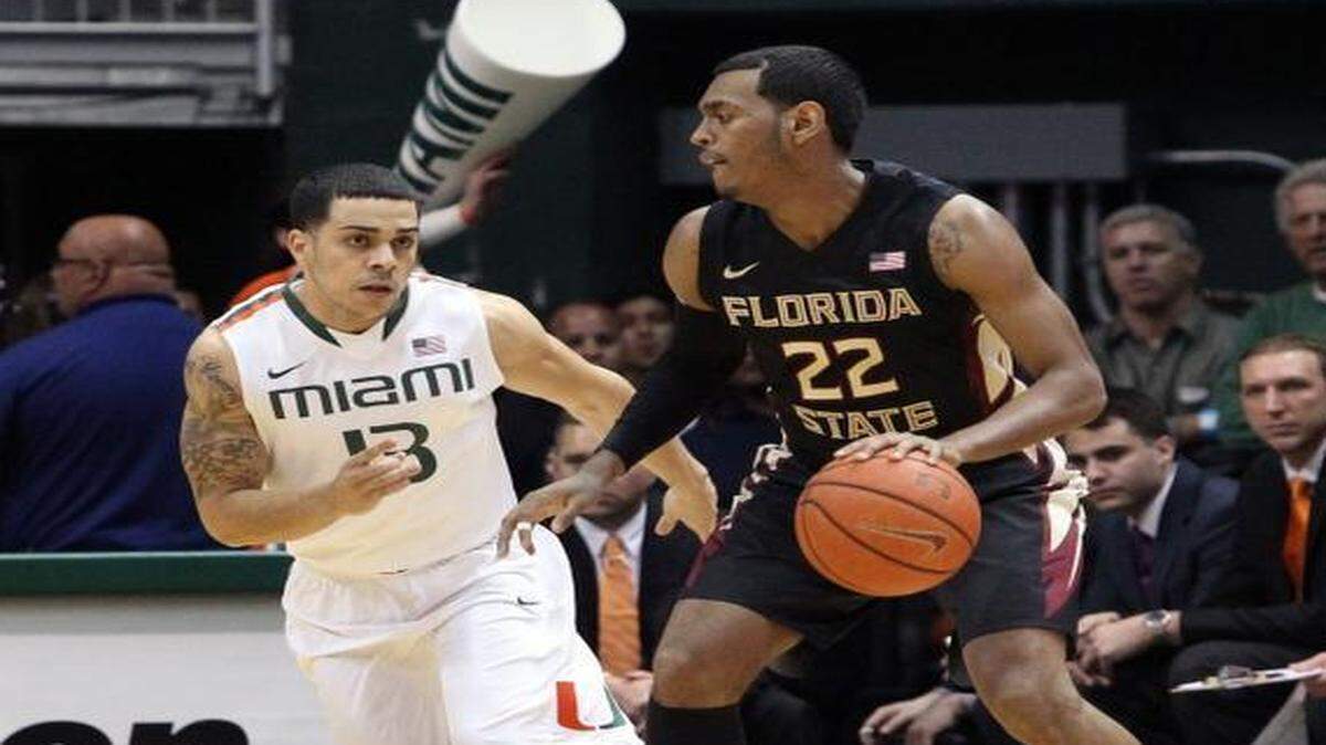 
Florida State’s Xavier Rathan-Mayes (right) scored 30 points in the final 4:38 of Wednesday’s game, but it wasn’t enough to beat the Miami Hurricanes. 
