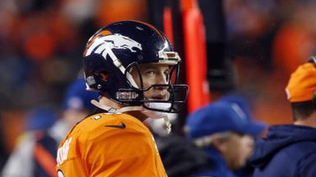 
Denver Broncos quarterback Peyton Manning watched the final seconds of Sunday’s playoff game from the sidelines.
