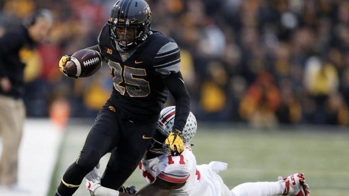 Iowa running back Akrum Wadley ran past Ohio State linebacker Jerome Baker a game on Nov. 4.