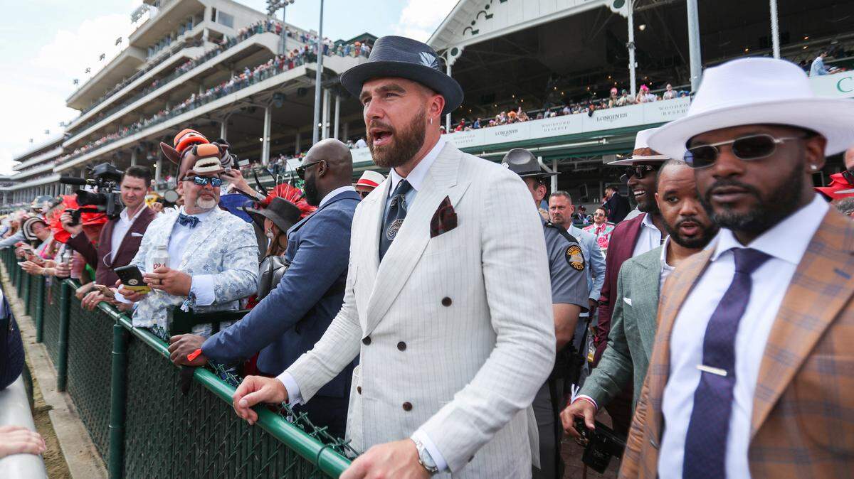 Kansa City Chiefs player Travis Kelce enjoys a race at the 150th running of the Kentucky Derby at Churchill Downs on May 4, 2024 in Louisville, Kentucky.