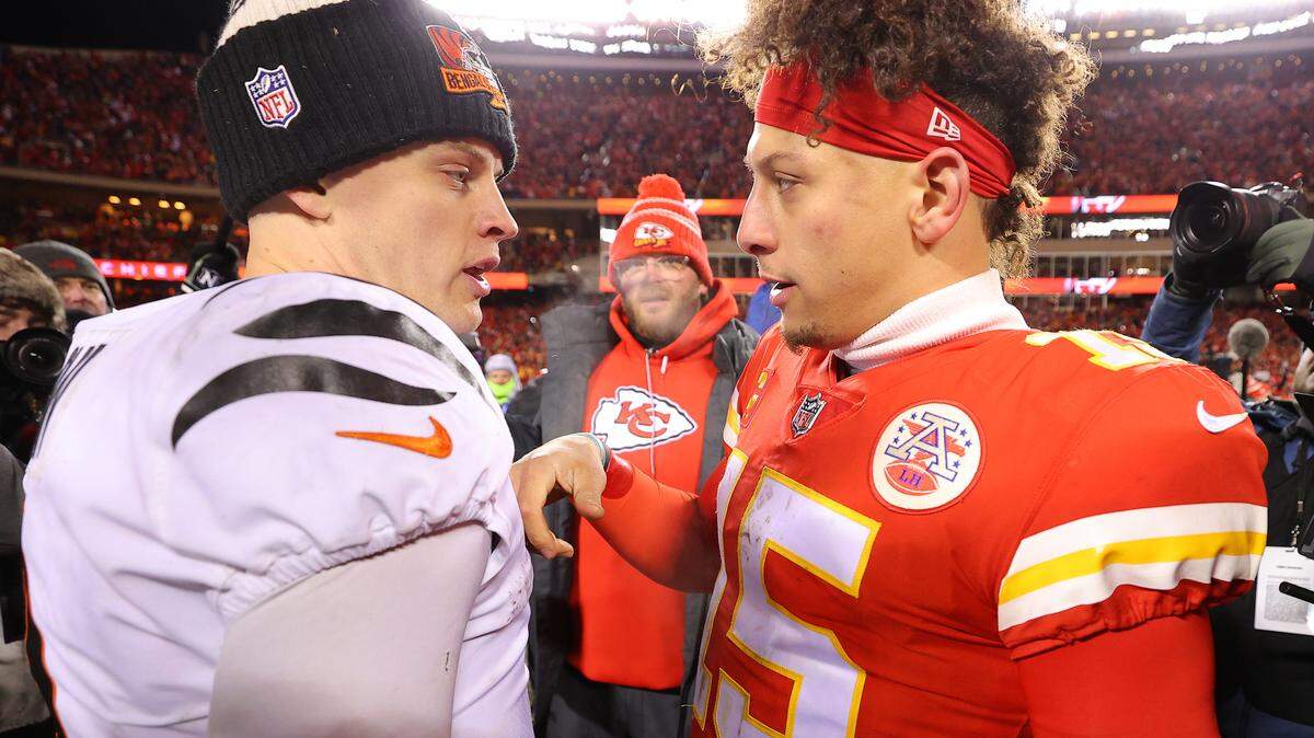 Bengals quarterback Joe Burrow and Patrick Mahomes #15 of the Kansas City Chiefs meet on the field after the AFC Championship Game at GEHA Field at Arrowhead Stadium on Jan. 29, 2023 in Kansas City, Missouri.