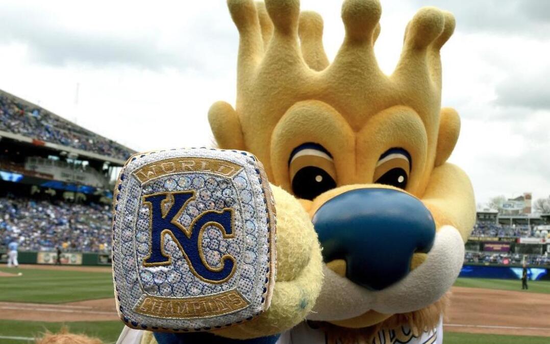 Kansas City Royals mascot Sluggerrr showed his 2015 World Series ring he received during a game against the Minnesota Twins on April 10.
