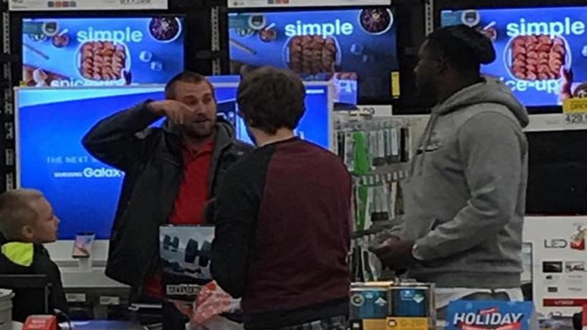 Wallace Gilberry doing something nice for a family at a Target store.