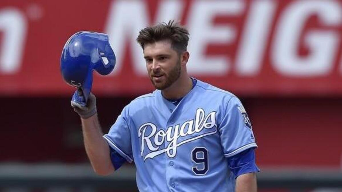 Kansas City Royals catcher Drew Butera tipped his helmet to the dugout after a double during Sunday’s game.