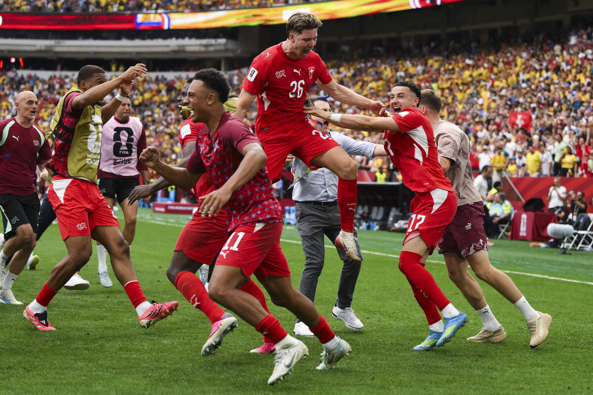 Ruben Vargas (No. 17) celebrates with Swiss teammates after scoring the fifth penalty during a shootout victory over Colombia in a FIFA World Cup Round of 16 match at BC Place Vancouver in Vancouver, Canada on July 7, 2026.