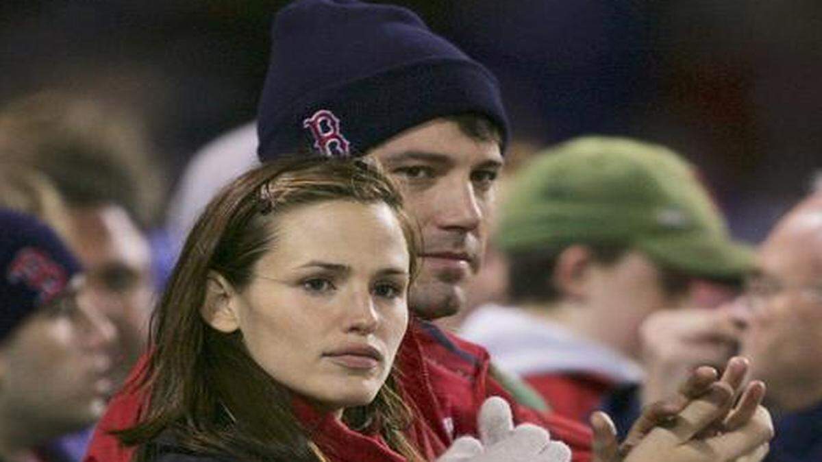 
Jennifer Garner and husband Ben Affleck were at Game 1 of the 2004 World Series in Boston,
