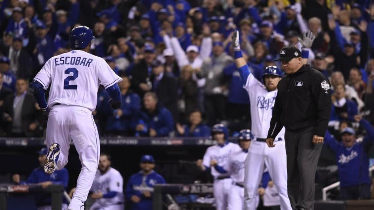 Kansas City Royals shortstop Alcides Escobar crossed home after hitting an inside-the-park home run during Game 1 of the World Series on Tuesday at Kauffman Stadium.