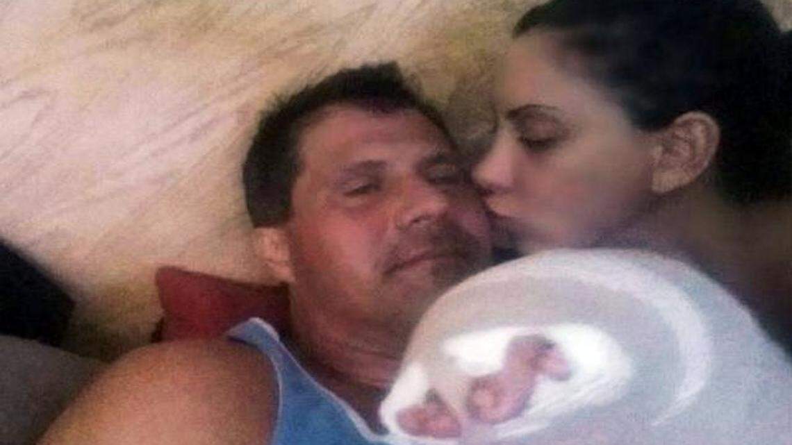 
This Wednesday, Oct. 29, 2014 photo posted on Jose Canseco’s Twitter page shows Canseco recovering at his Las Vegas home with his fiancee, Leila Knight, after Canseco shot himself in the finger last month. 
