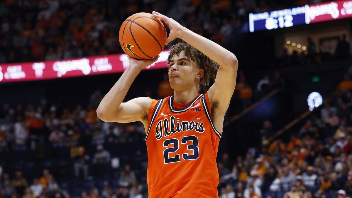 Keaton Wagler of the Illinois Fighting Illini makes a three-point shot during the first half of the Music City Madness game against the Tennessee Volunteers at Bridgestone Arena on Dec. 6, 2025 in Nashville, Tennessee.