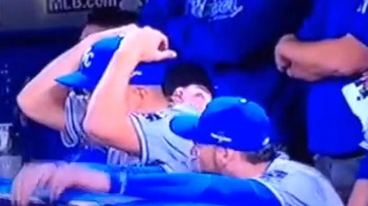 Royals pitcher Jeremy Guthrie took cover during Game 4.