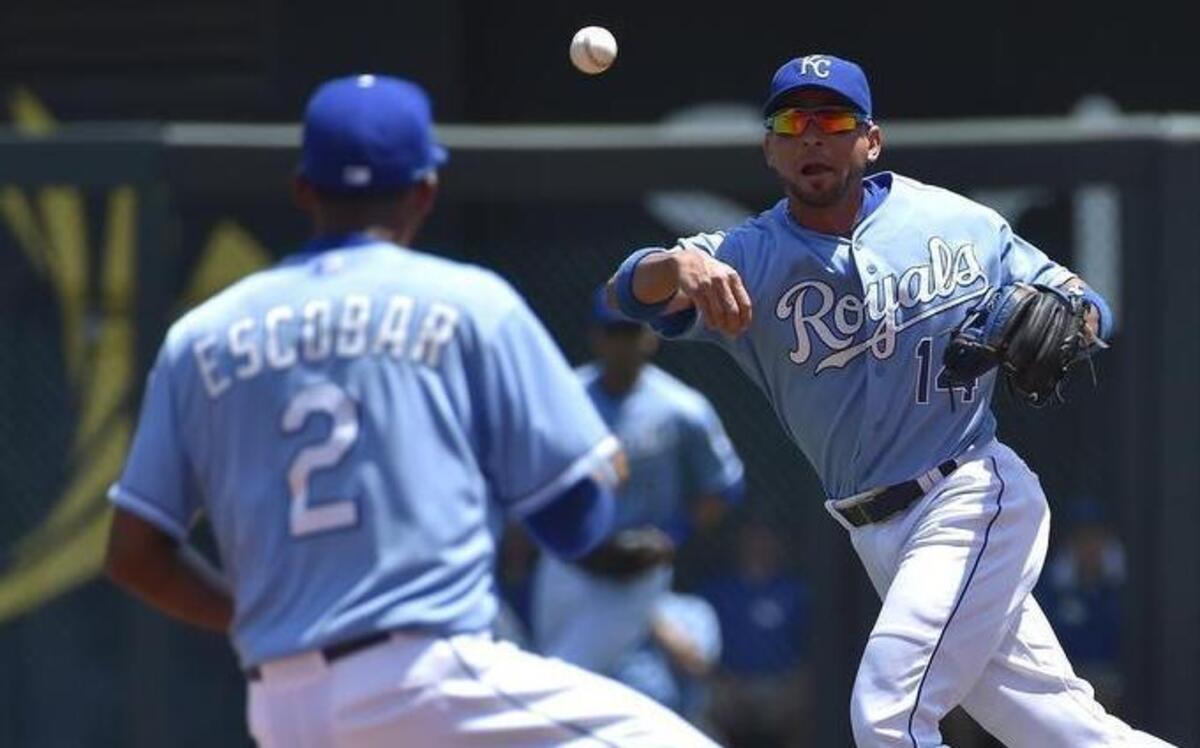 
Kansas City Royals second baseman Omar Infante threws a grounder from Houston Astros' Luis Valbuena to shortstop Alcides Escobar for a forceout during a game on July 26.
