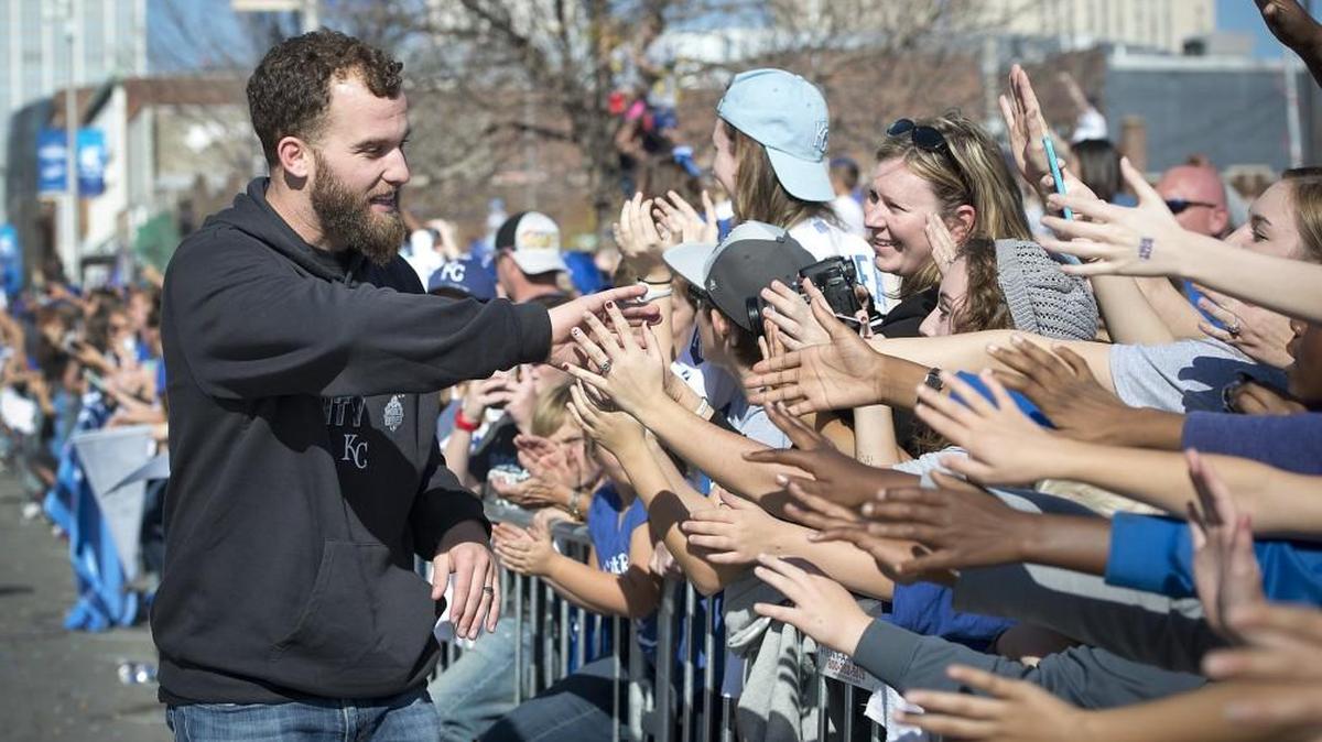 Royals pitcher Danny Duffy walked on the parade route to greet Royals fans that lined Grand Boulevard during the World Series victory parade on Nov. 3, 2015.