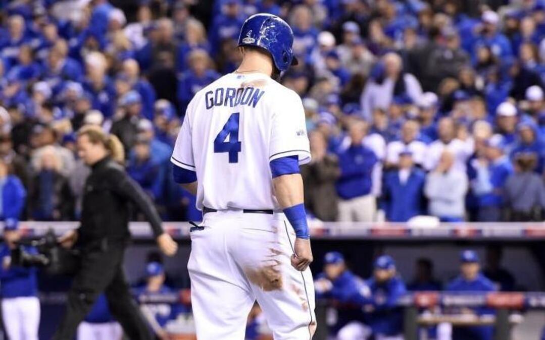 Kansas City Royals left fielder Alex Gordon made a long, lonely walk from third base to the dugout after he was left stranded on third as the possible tying run in the Royals’ 3-2 loss to the San Francisco Giants in Game 7 of the 2014 World Series.
