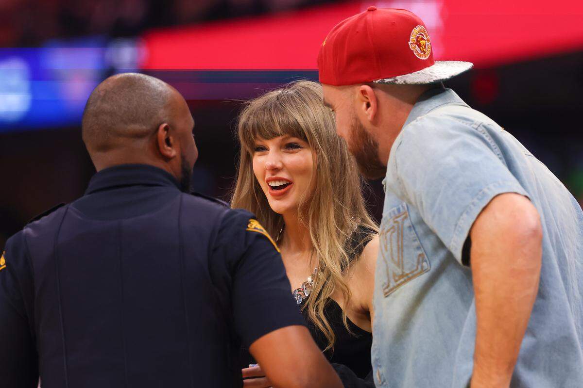 Singer Taylor Swift and Travis Kelce of the Kansas City Chiefs attend Game 3 between the New York Knicks and the Cleveland Cavaliers in the NBA Eastern Conference Finals at Rocket Arena on May 23, 2026 in Cleveland, Ohio.