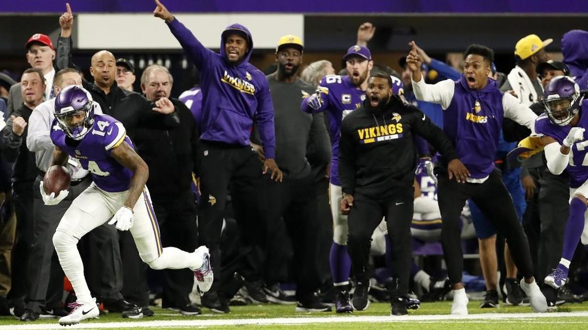 Minnesota Vikings receiver Stefon Diggs scores a 61-yard touchdown to win the game against the New Orleans Saints on Sunday.