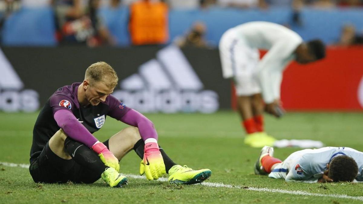 England goalkeeper Joe Hart (left) and his teammates react at the end of the Euro 2016 round of 16 soccer match between England and Iceland.