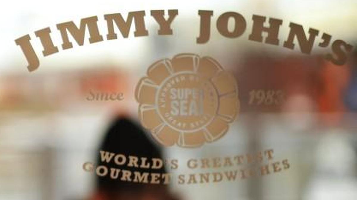 A sign advertises hiring opportunities at a Jimmy John’s sandwich shop.