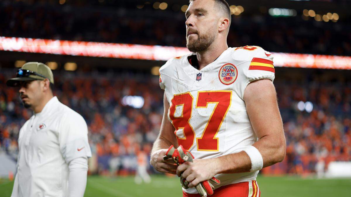 Travis Kelce of the Kansas City Chiefs walks off the field after the game against the Denver Broncos at Empower Field At Mile High on Nov. 16, 2025 in Denver, Colorado.