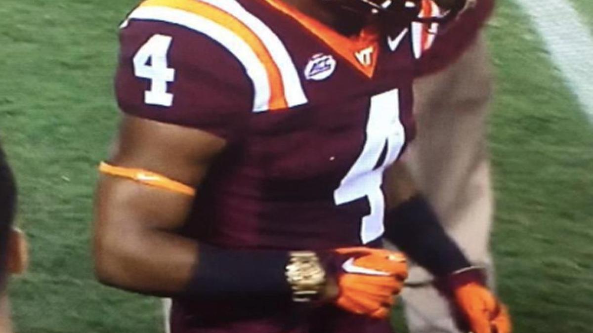 
Virginia Tech running back J.C. Coleman apparently wearing a gold watch.
