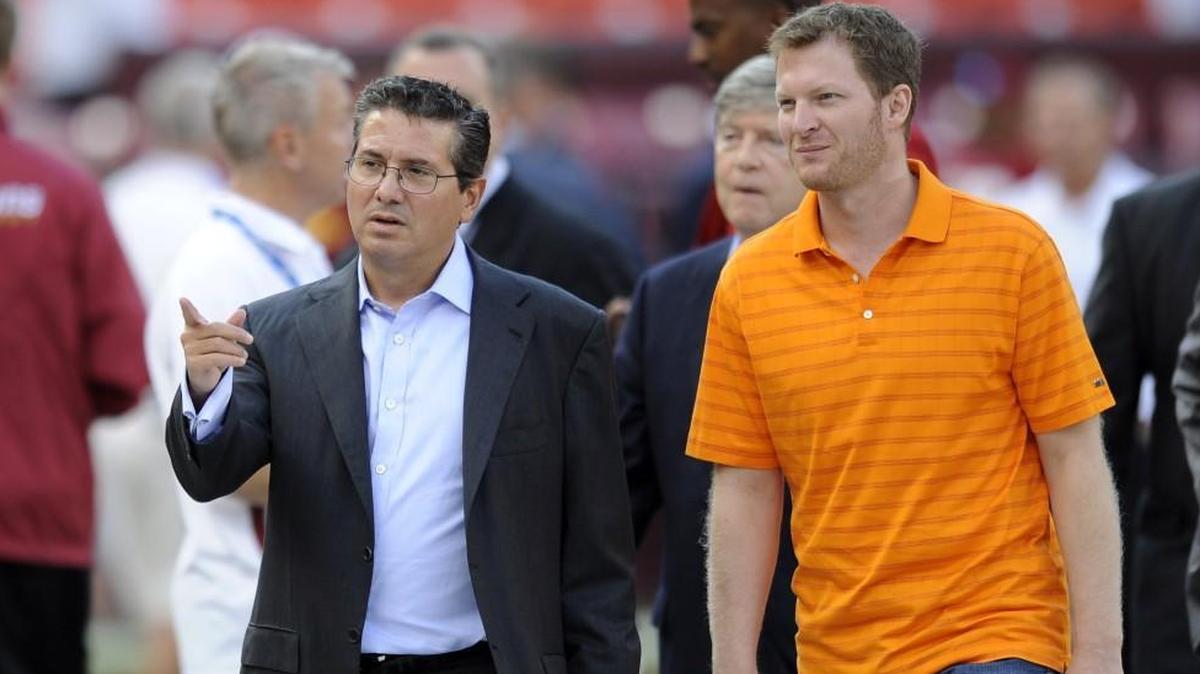 Washington owner Dan Snyder (left) with former NASCAR driver Dale Earnhardt Jr., on the field before an NFL preseason football game in Landover, Md. Earnhardt is a Washington fan.